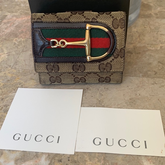 Gucci Handbags - Gucci Brit canvas short wallet